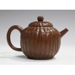 A Chinese polished Yixing stoneware teapot, probably 20th century, of ribbed globular form,