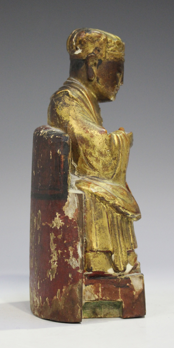 A Chinese gilt and polychrome painted carved wood figure of a dignitary, late Qing dynasty, seated - Image 19 of 20
