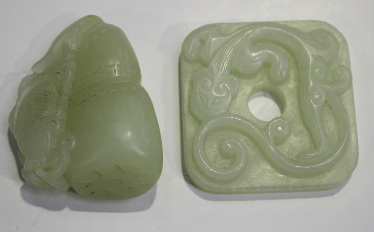 Two Chinese pale celadon jade pendants, late 19th/20th century, the first carved in the form of a