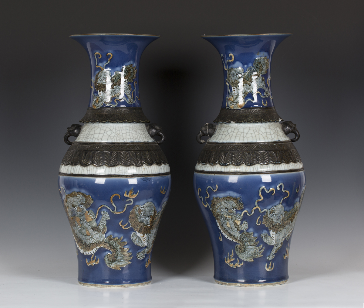 An impressive pair of Chinese blue and crackle glazed porcelain vases, late Qing dynasty, each of