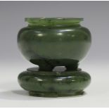 A Chinese jade miniature censer and stand, probably 20th century, the censer of bulbous form on