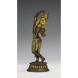 A Sino-Tibetan bronze figure of a bodhisattva, probably early 20th century, with parcel gilt