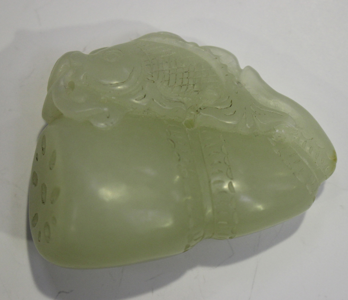 Two Chinese pale celadon jade pendants, late 19th/20th century, the first carved in the form of a - Image 5 of 8