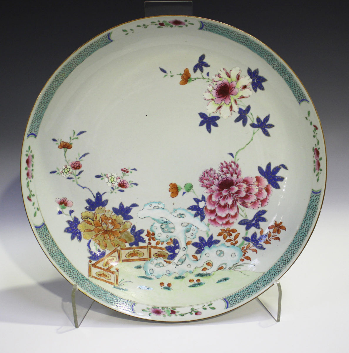 A Chinese famille rose export porcelain circular dish, Yongzheng/Qianlong period, painted with a - Image 10 of 10