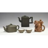 A Chinese black Yixing stoneware teapot and cover, 20th century, of rectangular form, each side