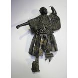 A Japanese bronze figure of an actor, Meiji period, modelled standing wearing a long robe, height