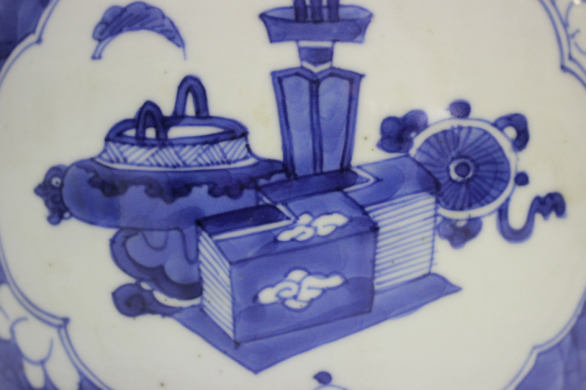 A Chinese blue and white porcelain ginger jar and cover, Kangxi period, painted with panels of - Image 3 of 11