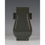 A Chinese dark grey crackle glazed stoneware hu vase of rectangular baluster section with canted