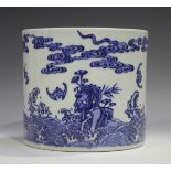 A Chinese blue and white porcelain brushpot, Kangxi style but later, of gently waisted cylindrical