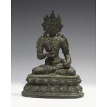 A Sino-Tibetan dark brown patinated bronze figure of Vajrapani, probably late Qing dynasty, modelled