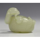 A Chinese pale celadon jade water coupe, carved in the form of a duck holding a lingzhi fungus in