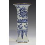 A Chinese blue and white porcelain gu-shaped beaker vase, Kangxi style but later, the upper body
