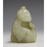 A Chinese pale celadon jade carving of a girl, probably 20th century, modelled kneeling with a