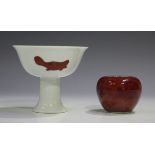 A Chinese sang-de-boeuf glazed porcelain water coupe of globular form, impressed seal mark to