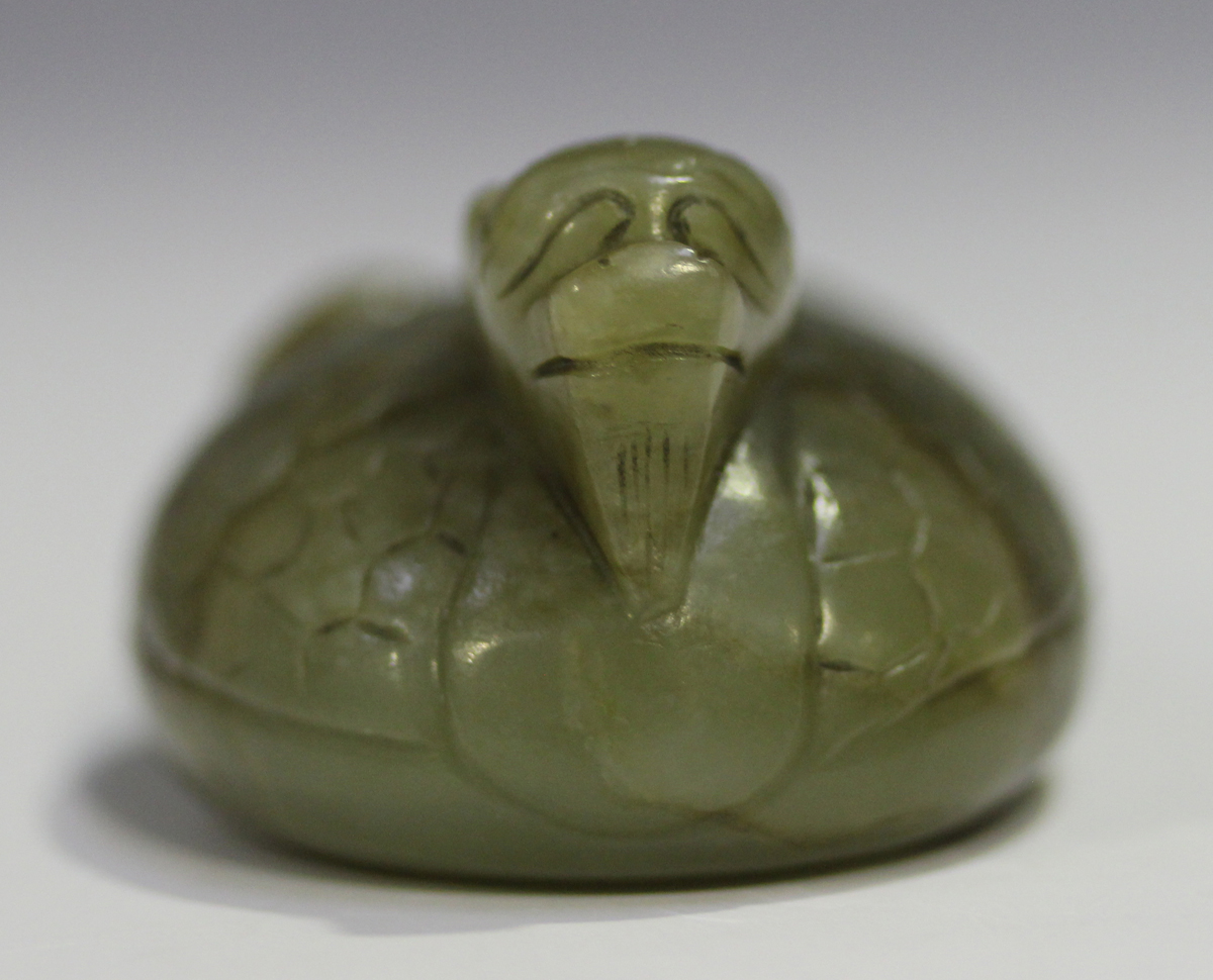 A Chinese carved celadon jade dragon pendant, 20th century, of oval shape, the stone with brown line - Image 10 of 10