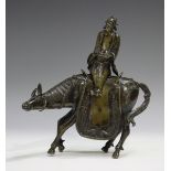 A Chinese brown patinated bronze incense burner, Qing dynasty, modelled as a detachable immortal