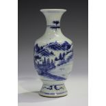 A Chinese blue and white porcelain vase, 18th century style but later, the baluster body with flared
