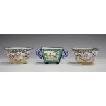 A Chinese Canton enamel two-handled bowl, Qing dynasty, the square tapering body painted with