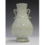 A Chinese Guan-type crackle glazed stoneware vase, probably 20th century, the pear-shaped body