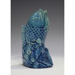 A Chinese turquoise glazed porcelain spill vase, late Qing dynasty, modelled as a fish leaping