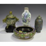 A small group of Chinese enamel wares, mostly 20th century, comprising a cloisonné tripod censer and
