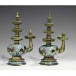 A near pair of Sino-Tibetan brass, copper and cloisonné enamel ceremonial water vessels (kundika),