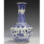 A Chinese blue and white porcelain bottle vase, mark of Kangxi but late 19th century, the bulbous