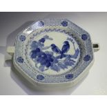 A Chinese blue and white porcelain octagonal warming plate, painted with birds perched on a