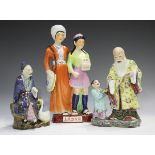 A Chinese famille rose porcelain figure group, mid-20th century, modelled as Shoulao and boy