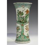 A Chinese famille verte porcelain beaker vase, Kangxi style but late 19th century, painted with five