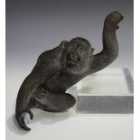 A Japanese carved hardwood hanging monkey, Meiji/Taisho period, finely carved with fur detail,