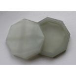 A Chinese celadon jade octagonal box and cover, 20th century, the base with concave underside, width