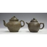 A Chinese Yixing stoneware teapot, inner strainer and cover, with bamboo moulded finial, handle