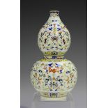 A Chinese doucai porcelain double gourd vase, mark of Qianlong but probably 20th century, both bulbs