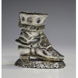 A late 19th century Continental silver novelty match holder/strike, modelled in the form of a