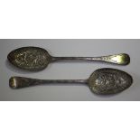 A matched pair of silver Old English pattern tablespoons, each bowl later engraved and chased with
