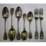 An early Victorian part canteen of silver Fiddle and Shell pattern cutlery, comprising three