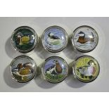 A set of six Elizabeth II silver and enamel Peter Scott 'Wildfowl Trust' cylindrical boxes and