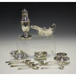 A George V silver sugar caster of baluster form, Birmingham 1931, height 16.5cm, together with a