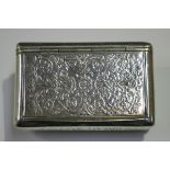A 19th century French silver rectangular snuff box, the hinged lid and sides decorated with