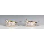 A pair of Elizabeth II silver novelty sauceboats and stands, each sauceboat of duck form, finely