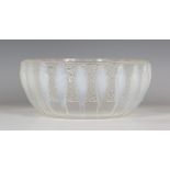 An Art Deco Lalique opalescent glass Perruches pattern bowl, circa 1931, the exterior moulded with a