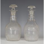 A pair of Anglo-Irish dip-moulded decanters and stoppers, late 18th/early 19th century, of