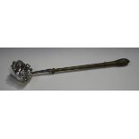 A George II silver punch ladle, the lobed oval bowl with pouring lip, fitted to a later turned