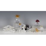 A group of Swarovski Crystal flowers and fruit, including a Secret Garden Collection maxi flower