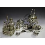 A collection of plated items, including a four-piece tea set, comprising teapot, hot water pot, milk