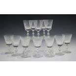 A part suite of Edinburgh Crystal glasses, 20th century, cut with stylized fans, including red and