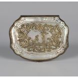 A late 18th century Continental silver and mother-of-pearl snuff box of cartouche form, decorated to
