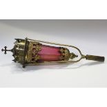 A late 19th/early 20th century ecclesiastical gilt brass processional lantern with inset cranberry