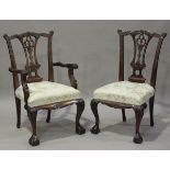 A set of eight modern George III style stained hardwood dining chairs, comprising two carvers and